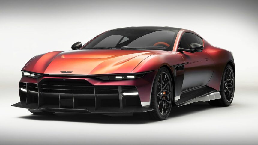 Vue de trois-quarts avant de l'Aston Martin Valen couleur rouge et bronze métallisé avec ses phares LED effilés et sa lame avant en carbone