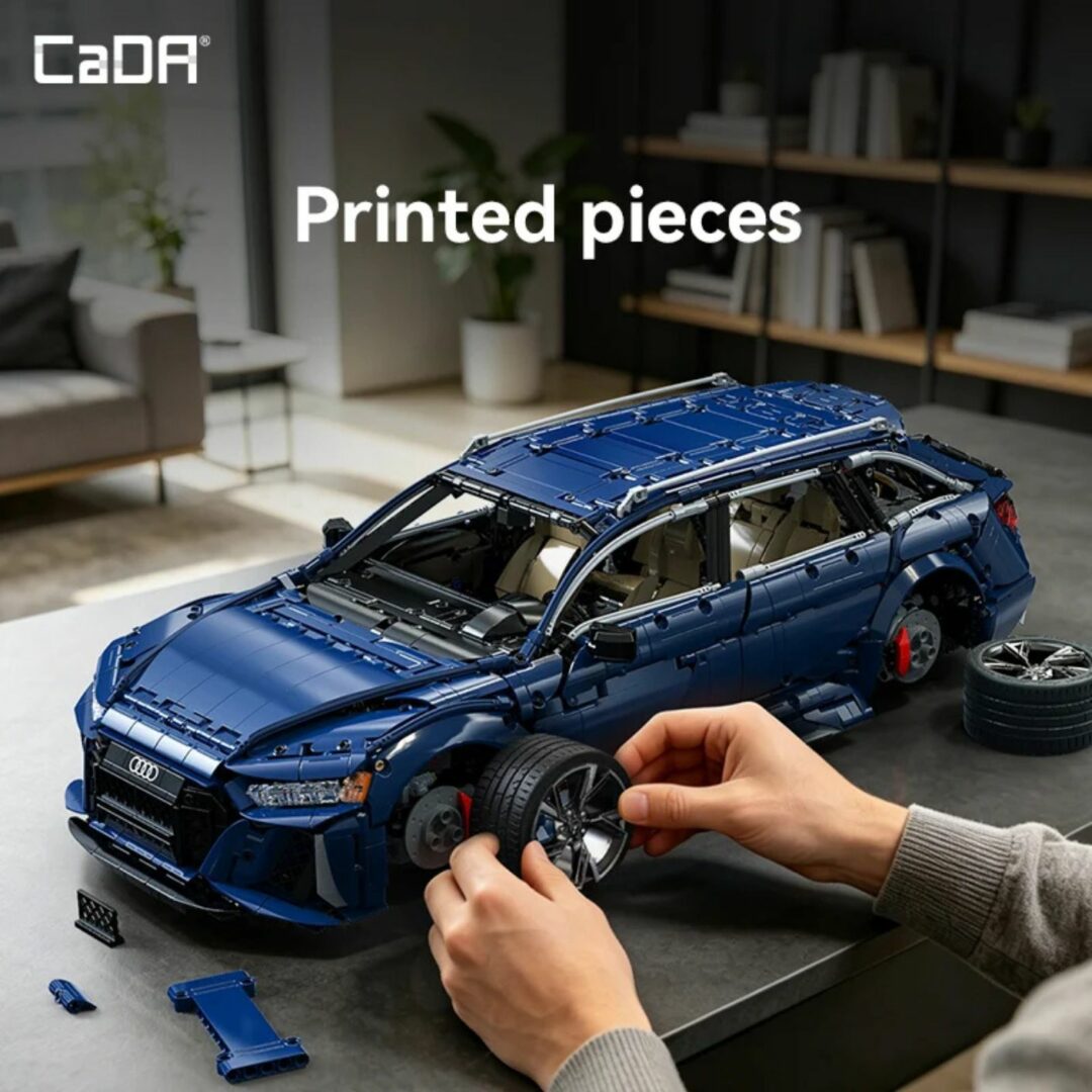 Personne en train d'installer une roue sur le modèle en briques CaDa Master Audi RS 6 Avant bleu avec texte Printed pieces