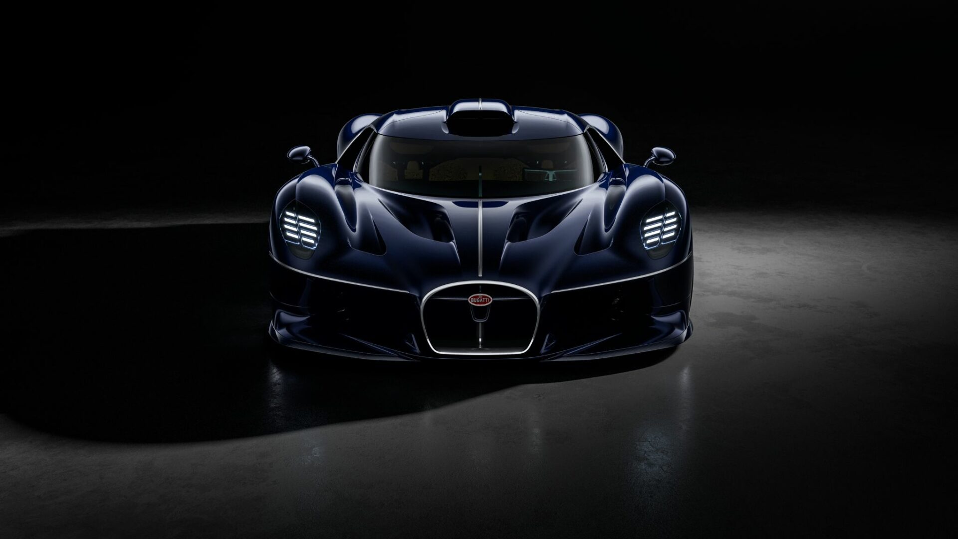 Vue plein face de la Bugatti Destrier bleu Sapphire Celeste en studio avec signature lumineuse à LED