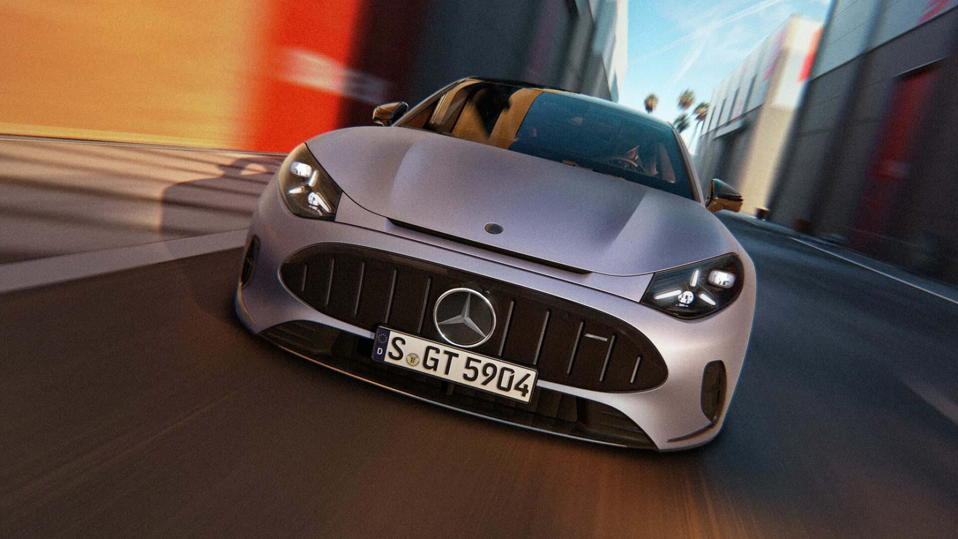 Face avant agressive de la Mercedes-AMG GT 4 portes électrique GT 53 en pleine action sur la route avec sa calandre Panamericana spécifique